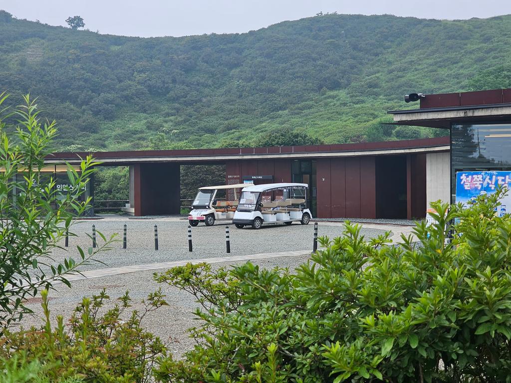 정상주차장 관광안내소앞 나눔카트투어 탑승장